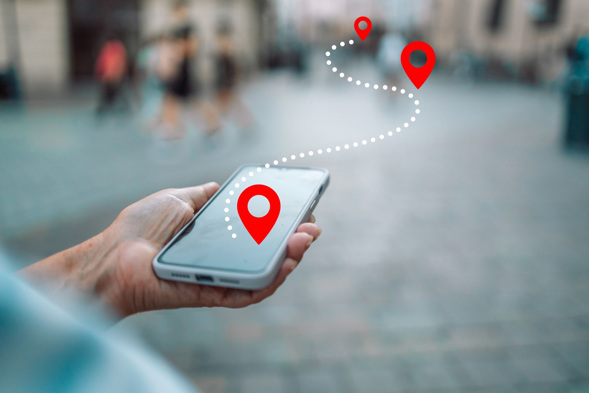 Woman tourist use maps app to navigate city, plan route from location to destination